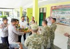 HUT-ke-81-TNI,-Polres-TTU-Serahkan-Tumpeng-ke-Kodim-1618/TTU,-Perkuat-Sinergitas-TNI-Polri