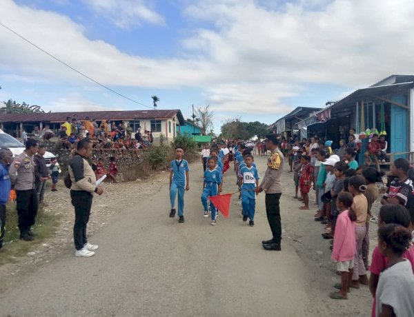 Polsek Miomaffo Barat Amankan Lomba Gerak Jalan Pelajar, Semarakkan HUT RI ke-81